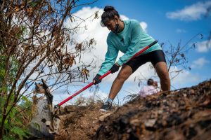 A landscaper digging